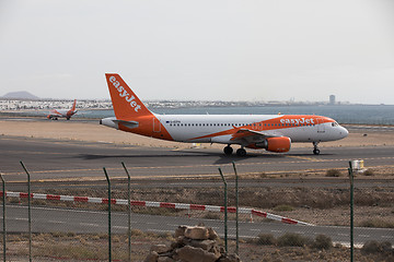 Image showing ARECIFE, SPAIN - APRIL, 15 2017: AirBus A320 - 200 of easyjet re