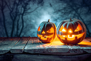 Image showing Halloween pumpkins on blue background