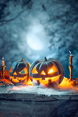 Image showing Halloween pumpkins on blue background