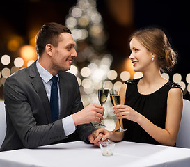 Image showing couple with non alcoholic champagne at christmas