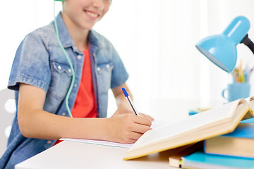Image showing close up of student boy doing homework