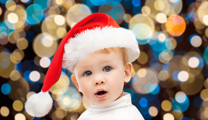 Image showing little baby boy in santa hat at christmas