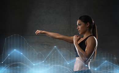 Image showing woman boxing in gym