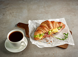 Image showing Croissant with ham and cheese