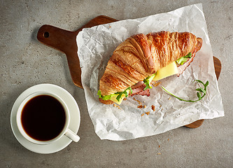 Image showing Croissant with ham and cheese