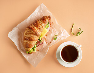 Image showing Croissant with ham and cheese