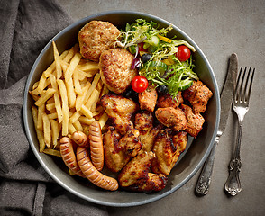 Image showing plate of various meats and vegetables