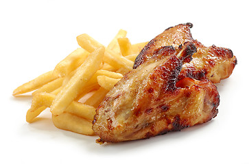 Image showing fried potatoes and chicken wings