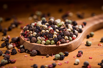 Image showing Mixed peppercorns. Dry mix peppercorns close up