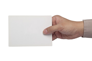 Image showing Holding a blank paper card