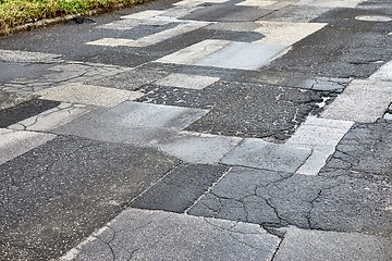 Image showing Patched broken road