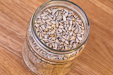 Image showing Sunflower seeds in a jar