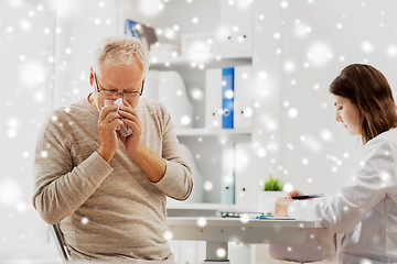 Image showing senior man and doctor meeting at hospital