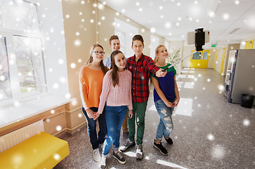 Image showing group of students taking selfie with smartphone