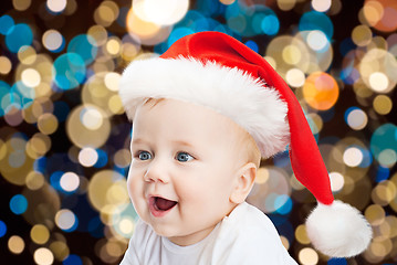 Image showing little baby boy in santa hat at christmas