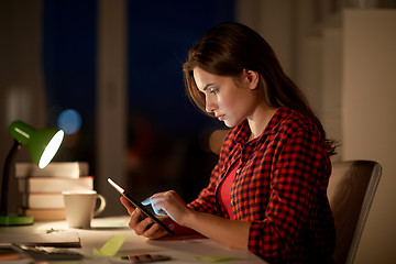 Image showing student girl or woman with tablet pc at night home