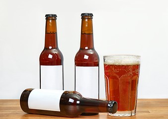 Image showing Beer bottles on a table