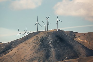 Image showing Wind tubines on a hill