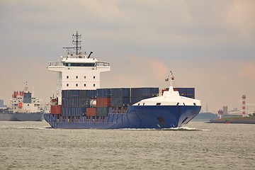 Image showing Ship carrying containers through Rotterdam