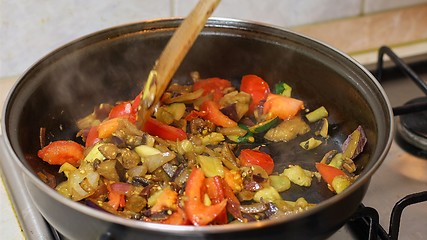 Image showing Preparing hot breakfast