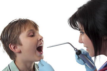 Image showing Doctor examining child.