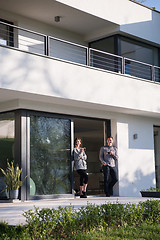 Image showing couple enjoying on the door of their luxury home villa