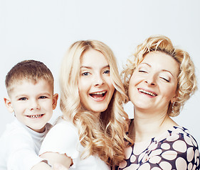 Image showing happy smiling family together posing cheerful on white background, lifestyle people concept, mother with son and teenage daughter isolated 