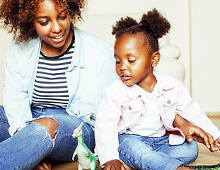 Image showing adorable sweet young afro-american mother with cute little daugh