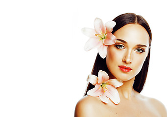 Image showing young attractive lady close up with hands on face isolated flowe