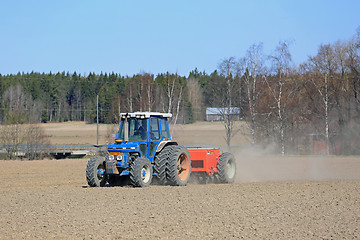 Image showing Ford 6610 Tractor and Seeder on Field