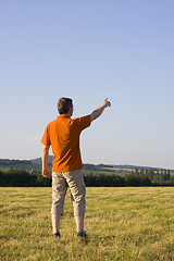 Image showing Man pointing with outstretched arm