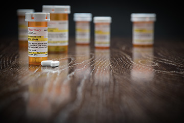 Image showing Variety of Non-Proprietary Prescription Medicine Bottles and Pil