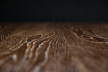 Image showing Wooden Background Surface with Narrow Depth of Field Fading to B