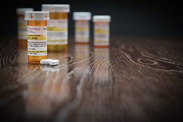 Image showing Variety of Non-Proprietary Prescription Medicine Bottles and Pil