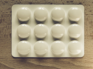 Image showing Vintage looking Medical pills on a table