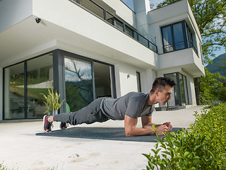 Image showing man doing morning yoga exercises