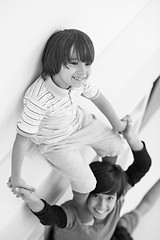 Image showing young boys posing line up piggyback top view