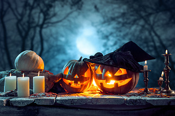 Image showing Halloween pumpkins on blue background