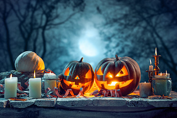 Image showing Halloween pumpkins on blue background