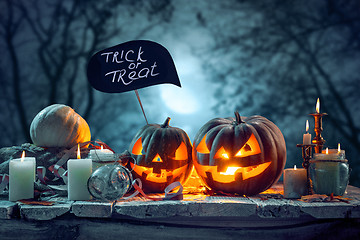 Image showing Halloween pumpkins on blue background