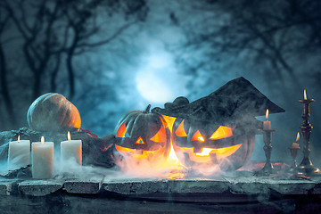 Image showing Halloween pumpkins on blue background