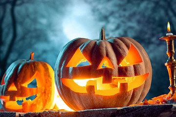 Image showing Halloween pumpkins on blue background