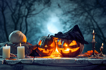 Image showing Halloween pumpkins on blue background