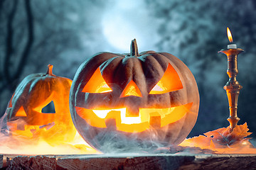 Image showing Halloween pumpkins on blue background