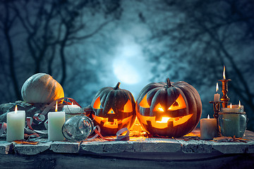 Image showing Halloween pumpkins on blue background