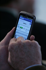Image showing Texting on a Smart Phone