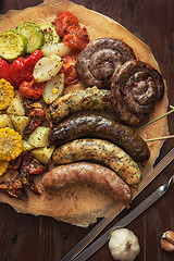 Image showing Grilled sausages with vegetables