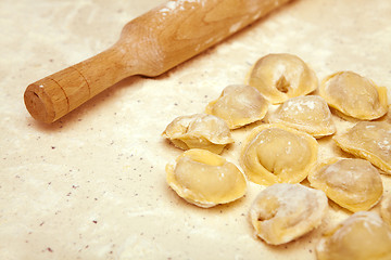 Image showing rolling pin and ravioli on table