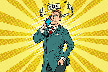 Image showing Businessman talking on the phone about finances