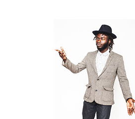 Image showing young handsome afro american boy in stylish hipster hat gesturin